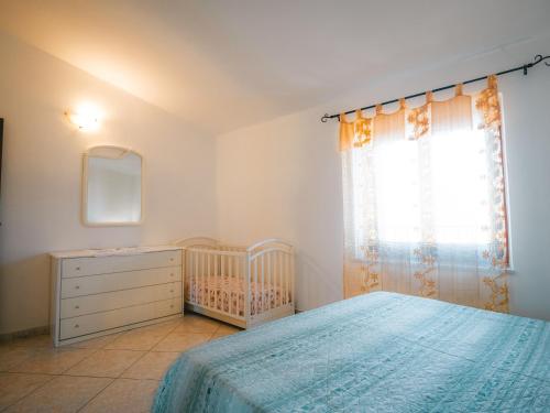 Postel nebo postele na pokoji v ubytování Casa vico roma Rosanto