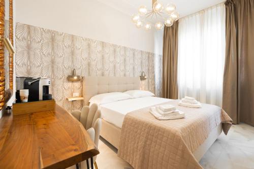 Katil atau katil-katil dalam bilik di Avenue Suites