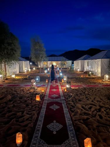 Gambar di galeri bagi Erg Chebbi Dunes Desert Camp di Merzouga