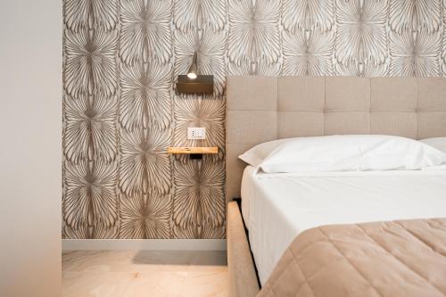 Katil atau katil-katil dalam bilik di Avenue Suites