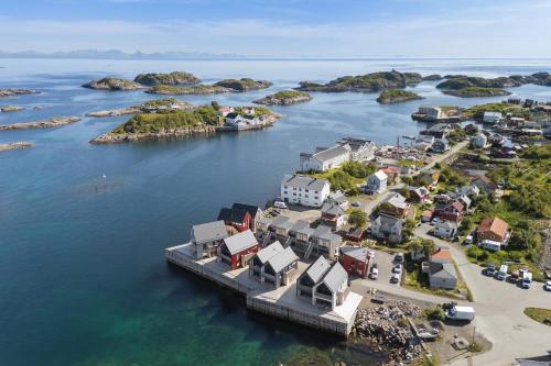 an aerial view of an island in the water at Rorbuleilighet Lysøya 1H in Henningsvær
