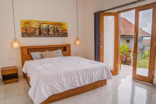 Giường trong phòng chung tại Pondok Dayuh Homestay