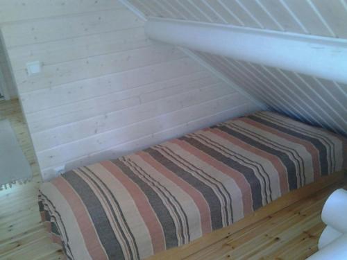 Katil atau katil-katil dalam bilik di Convenient Apartment for 6 with Sauna