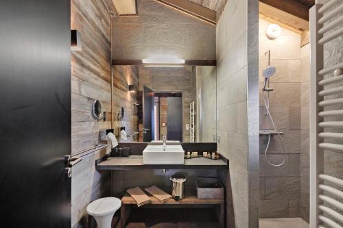 a bathroom with a sink and a mirror at Chalet Vista - Bolquère in Bolquere Pyrenees 2000