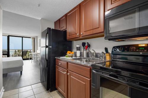 Η κουζίνα ή μικρή κουζίνα στο Casa Palmera By Casanita - Small-Dog Friendly Suite