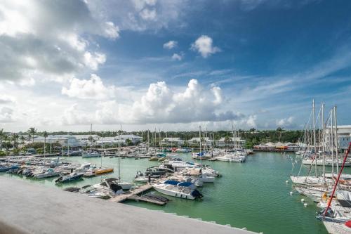 a bunch of boats docked in a harbor at Appartement Honoré in Saint-François