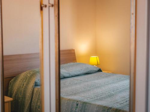 Postel nebo postele na pokoji v ubytování Casa vico roma Rosanto