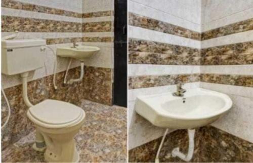 un baño con inodoro y lavabo en Collection O Behror, en Neemrana