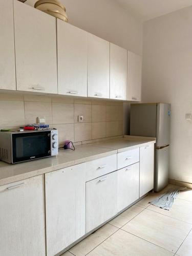 Kuchyň nebo kuchyňský kout v ubytování Appartement 211