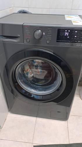 a baby in the inside of a washing machine at Econom house in Naryn