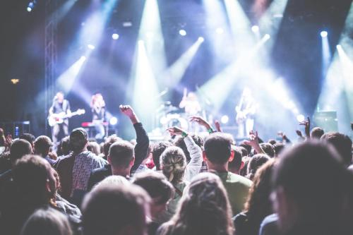 a crowd of people in front of a concert at Holiday Inn - the niu, Sparrow Regensburg by IHG in Regensburg