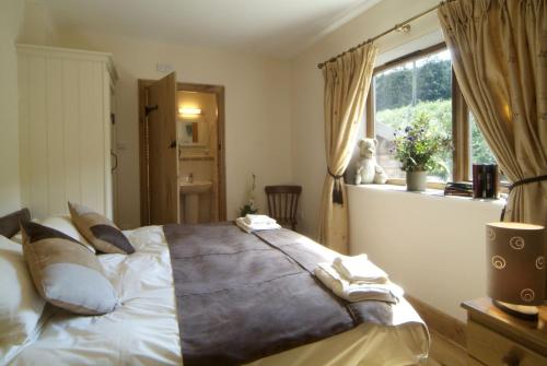 Postel nebo postele na pokoji v ubytování Curlew Cottage