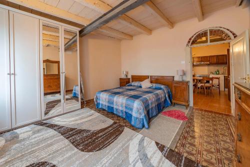 Katil atau katil-katil dalam bilik di Dimora Borgo Gaon - Casa Elios con wi-fi e 3 bagni