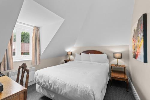 Postel nebo postele na pokoji v ubytování Manoir de la Tour