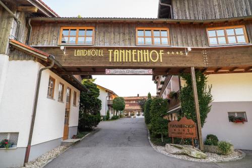 a building with a sign that reads hirschhoff mansion at Landhotel Tannenhof in Spiegelau