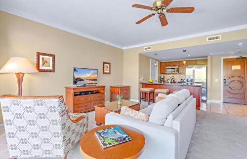 a living room with a couch and a table at Honua Kai Resort And Spa By Maui Resort Rentals in Lahaina