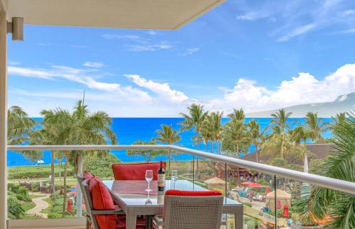 a view of the ocean from the balcony of a resort at Honua Kai Resort And Spa By Maui Resort Rentals in Lahaina