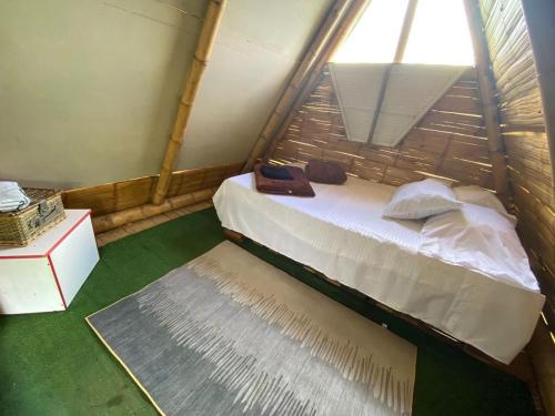 Katil atau katil-katil dalam bilik di cabaña hotel oasis