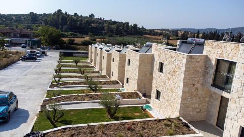 an aerial view of a building with a garden at The Olive Path in Kalandra