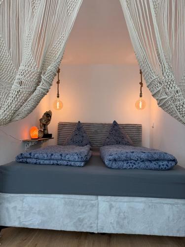 Una cama o camas en una habitación de Alpspitz Refugium