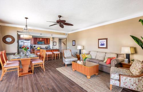 a living room with a couch and a table at Honua Kai Resort And Spa By Maui Resort Rentals in Lahaina
