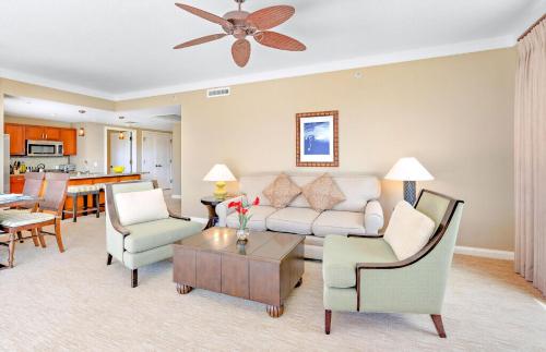a living room with a couch and chairs and a table at Honua Kai Resort And Spa By Maui Resort Rentals in Lahaina
