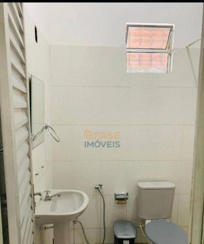 a small bathroom with a sink and a toilet at Casa COP 30 BELÉM-Mosqueiro in Belém