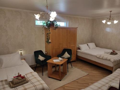 Katil atau katil-katil dalam bilik di Apartmenti Ezerkrasti