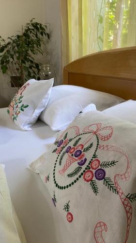 Postel nebo postele na pokoji v ubytování Topole