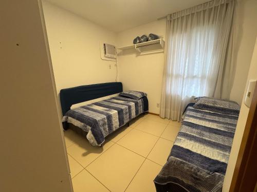 Ένα ή περισσότερα κρεβάτια σε δωμάτιο στο Beach Club Vista Mar