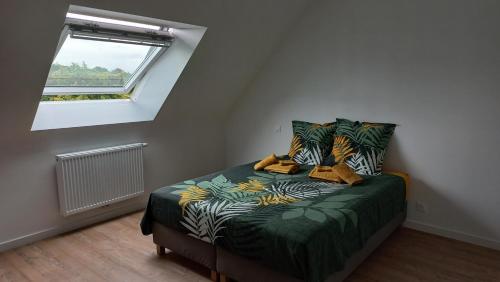 Postel nebo postele na pokoji v ubytování Villa de la Presqu'île Hillion