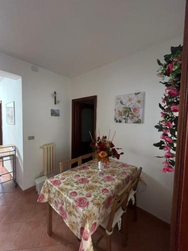Postel nebo postele na pokoji v ubytování Casa vacanze L arco