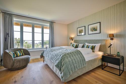 Voodi või voodid majutusasutuse Ferienhaus One Sylt - Traumhaus unter Reet, zwischen Wattenmeer und Nordsee toas