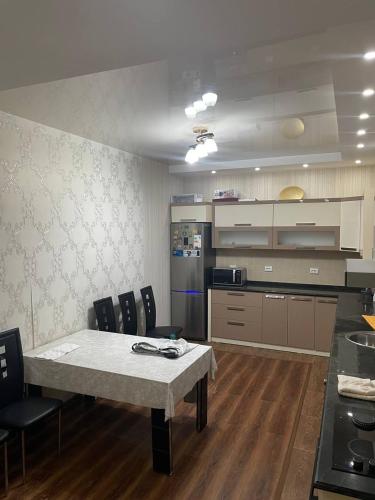 Virtuvė arba virtuvėlė apgyvendinimo įstaigoje Apartment