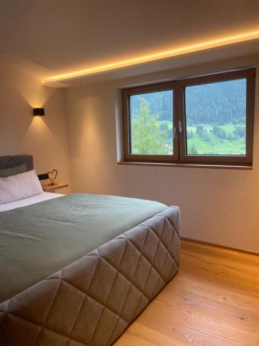 Postel nebo postele na pokoji v ubytování Appartement Waldzauber