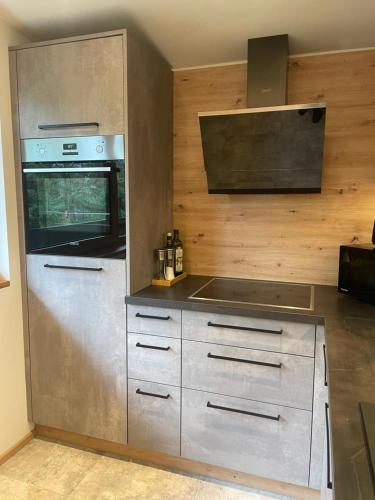 Kuchyň nebo kuchyňský kout v ubytování Appartement Waldzauber