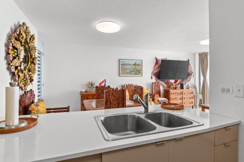 a kitchen with a sink and a counter top at The Best View in Luquillo Beach Front View in Luquillo