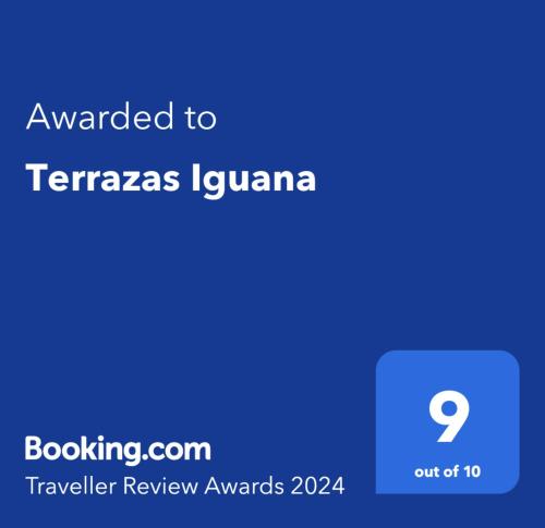 a screenshot of a cell phone with the text awarded to terrazas iguana at Terrazas Iguana in Máncora