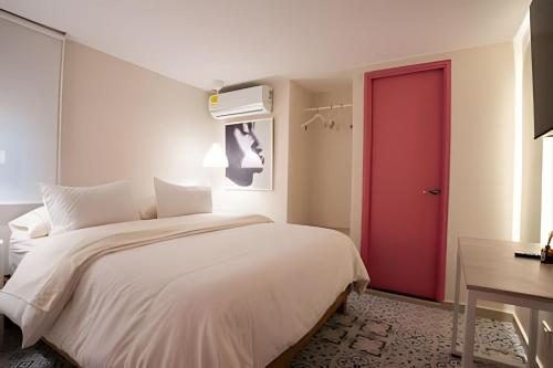 Postel nebo postele na pokoji v ubytování Marmulata Rooms