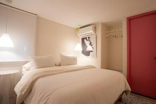 Postel nebo postele na pokoji v ubytování Marmulata Rooms