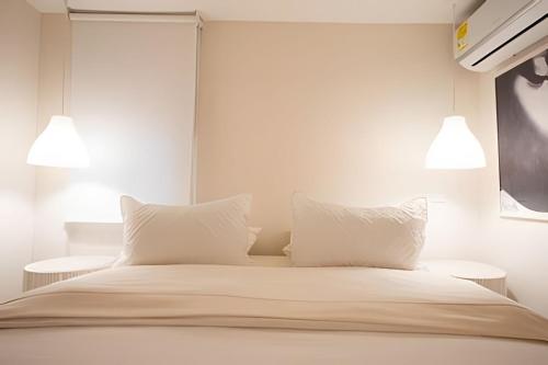 Postel nebo postele na pokoji v ubytování Marmulata Rooms
