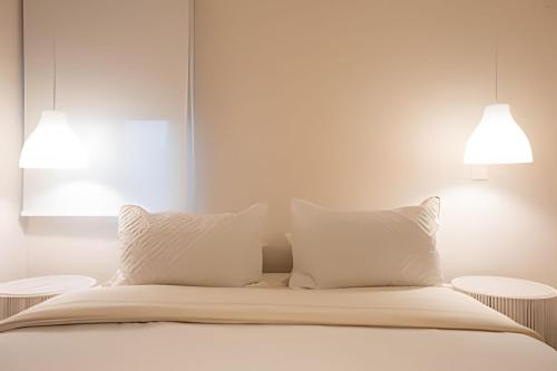 Postel nebo postele na pokoji v ubytování Marmulata Rooms