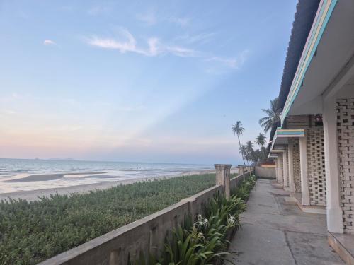 a house with a view of the beach at Tanjung Chap Beach Resort in Bachok