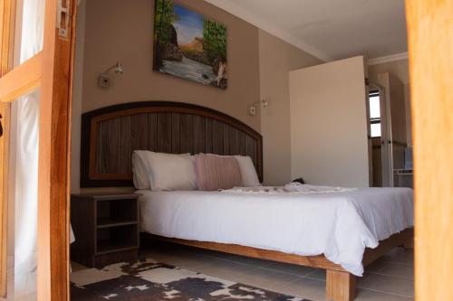 Ένα ή περισσότερα κρεβάτια σε δωμάτιο στο Goba Lodge & Rest Camp