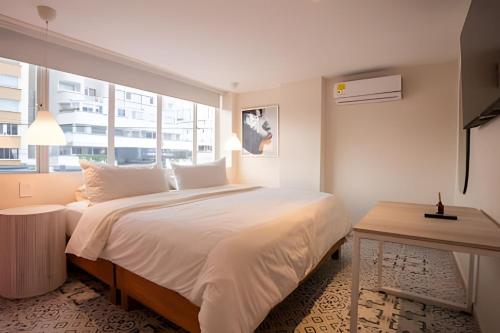 Postel nebo postele na pokoji v ubytování Marmulata Rooms