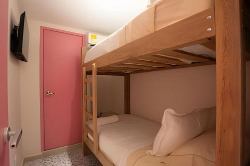 Postel nebo postele na pokoji v ubytování Marmulata Rooms