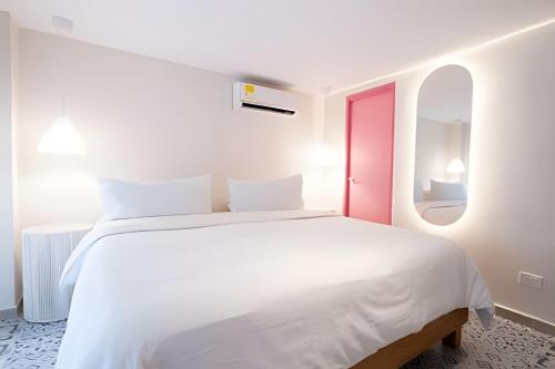 Postel nebo postele na pokoji v ubytování Marmulata Rooms
