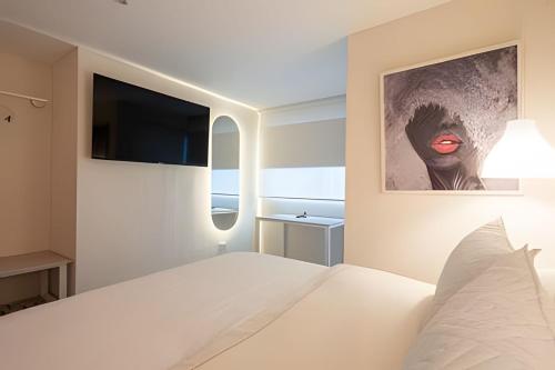 Postel nebo postele na pokoji v ubytování Marmulata Rooms