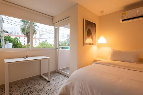 Postel nebo postele na pokoji v ubytování Marmulata Rooms