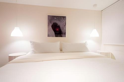 Postel nebo postele na pokoji v ubytování Marmulata Rooms